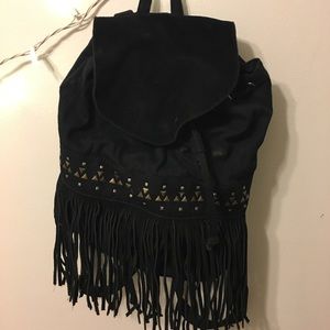 Super cool black backpack purse with fringe!